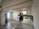 Bright kitchen with stainless steel appliances, modern finishes and wood-look flooring at 3681 Melonies Dr # 29, Las Vegas, NV 89103