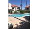 Community pool surrounded by lush landscaping offers a refreshing escape for residents at 3681 Melonies Dr # 29, Las Vegas, NV 89103
