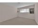 Carpeted bedroom featuring a window at 3753 Meadowcrest Dr, Las Vegas, NV 89121