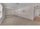 Spacious bedroom featuring plush carpeting, large mirrored closet, and neutral paint tones at 3753 Meadowcrest Dr, Las Vegas, NV 89121