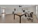 Bright bonus room with plentiful windows, a modern desk setup, and versatile space at 3753 Meadowcrest Dr, Las Vegas, NV 89121