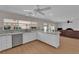 Bright kitchen with stainless steel appliances and a breakfast bar area at 3753 Meadowcrest Dr, Las Vegas, NV 89121