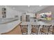 Bright, updated kitchen featuring granite countertops, stainless steel appliances, and open shelving at 3753 Meadowcrest Dr, Las Vegas, NV 89121