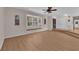 Expansive living room featuring a window seat, hardwood floors, and a cozy ambiance at 3753 Meadowcrest Dr, Las Vegas, NV 89121
