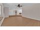 Open-concept living room with hardwood floors, and seamless transitions between living spaces at 3753 Meadowcrest Dr, Las Vegas, NV 89121