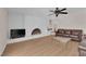 A spacious living room showcasing a painted brick fireplace at 3753 Meadowcrest Dr, Las Vegas, NV 89121