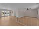 Open living space with chandelier and French doors that leads to the backyard at 3753 Meadowcrest Dr, Las Vegas, NV 89121
