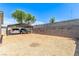 Large backyard with covered parking and gravel landscaping provides ample space for outdoor activities and storage at 4168 Wendy Ln, Las Vegas, NV 89115