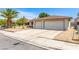 Charming single-story home featuring a well-maintained yard and two-car garage at 4168 Wendy Ln, Las Vegas, NV 89115