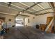 Open garage space with laundry, storage, and outside access at 4168 Wendy Ln, Las Vegas, NV 89115