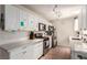 Bright kitchen featuring modern stainless steel appliances and quartz countertops at 4168 Wendy Ln, Las Vegas, NV 89115