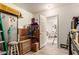 Utility storage with access doorway and utility items at 4168 Wendy Ln, Las Vegas, NV 89115