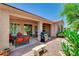 Charming backyard with a covered patio, grill, desert landscaping, seating, and plenty of shade at 4174 Cascada Piazza Ln, Las Vegas, NV 89135