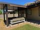 This outdoor patio features comfortable seating under a stylish pergola, perfect for relaxation at 4337 Stardusk Falls Ave, North Las Vegas, NV 89084