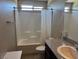 Clean bathroom with a granite vanity and tub-shower combo, providing a functional space at 4337 Stardusk Falls Ave, North Las Vegas, NV 89084