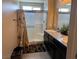 Bathroom features a double vanity and glass enclosed shower offering modern elegance at 4337 Stardusk Falls Ave, North Las Vegas, NV 89084