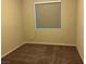 Comfortable bedroom with soft carpet and window with blinds for natural light at 4337 Stardusk Falls Ave, North Las Vegas, NV 89084