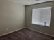 Neutral bedroom with a window and blinds, providing natural light and privacy at 4337 Stardusk Falls Ave, North Las Vegas, NV 89084