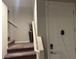 Welcoming entryway with a neutral color scheme and steps leading to the upper level at 4337 Stardusk Falls Ave, North Las Vegas, NV 89084