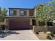 Attractive two-story home boasts a brick driveway, two-car garage, and well-maintained front yard at 4337 Stardusk Falls Ave, North Las Vegas, NV 89084