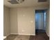 A standard bedroom with tile flooring and two doors at 4337 Stardusk Falls Ave, North Las Vegas, NV 89084