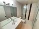 Modern bathroom with stylish vanity, updated shower, and sleek glass doors at 435 Mesa Blvd # 202, Mesquite, NV 89027