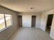 Bedroom with a bright window, wide closet and tile flooring at 435 Mesa Blvd # 202, Mesquite, NV 89027