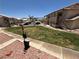 Condo community featuring manicured green spaces and convenient parking at 435 Mesa Blvd # 202, Mesquite, NV 89027