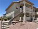 The exterior showcases stairs to upper units and desert landscaping at 435 Mesa Blvd # 202, Mesquite, NV 89027