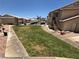 Condo complex surrounded by well-kept lawns and beautiful landscaping at 435 Mesa Blvd # 202, Mesquite, NV 89027