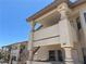 Exterior shot of upper units with decorative pillars and clear blue skies at 435 Mesa Blvd # 202, Mesquite, NV 89027