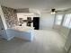 Bright kitchen features white cabinets, modern appliances, and a convenient breakfast bar at 435 Mesa Blvd # 202, Mesquite, NV 89027