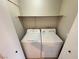 Functional laundry closet features a washer and dryer, maximizing space efficiency at 435 Mesa Blvd # 202, Mesquite, NV 89027