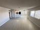 Bright living room offers an open layout with windows and access to other areas at 435 Mesa Blvd # 202, Mesquite, NV 89027