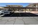 Covered parking area with a white GMC truck parked, offering protection from the elements at 435 Mesa Blvd # 202, Mesquite, NV 89027