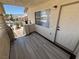 View of the front porch with gray tile flooring and a door leading inside the condo at 435 Mesa Blvd # 202, Mesquite, NV 89027