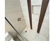 Walk-in shower with sleek glass doors, neutral tile, and convenient shelving at 435 Mesa Blvd # 202, Mesquite, NV 89027