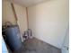 Small utility room with water heater and storage space at 435 Mesa Blvd # 202, Mesquite, NV 89027