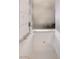 Bright bathtub features a tile surround and silver fixtures at 4381 W Flamingo Rd # 1512, Las Vegas, NV 89103