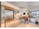 Modern, stainless steel kitchen with a full suite of appliances and a breakfast bar with seating at 4381 W Flamingo Rd # 1512, Las Vegas, NV 89103