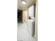 Convenient laundry room featuring a stacked washer and dryer at 4420 Rich Dr # B, Las Vegas, NV 89102