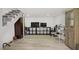 Finished basement area with durable flooring, a entertainment center, and versatile recreational space at 4490 W Warm Springs Rd, Las Vegas, NV 89118