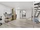 Open basement featuring resilient flooring and direct access to the stairs, offering flexible use potential at 4490 W Warm Springs Rd, Las Vegas, NV 89118