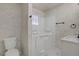 Bright bathroom featuring a walk-in tub for easy access and safety, enhancing the home's accessibility at 4490 W Warm Springs Rd, Las Vegas, NV 89118