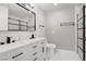 Tastefully designed bathroom featuring a double vanity, modern fixtures, and a sleek glass shower at 4490 W Warm Springs Rd, Las Vegas, NV 89118