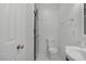 Bright bathroom features a shower and single sink vanity at 4490 W Warm Springs Rd, Las Vegas, NV 89118