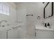 Bright bathroom featuring a walk-in tub for easy access and safety, enhancing the home's accessibility at 4490 W Warm Springs Rd, Las Vegas, NV 89118