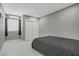 Cozy bedroom with lots of natural light, window with blinds, marble floors and closet at 4490 W Warm Springs Rd, Las Vegas, NV 89118