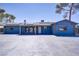 Home with solar panels, ample parking, and many windows for natural light at 4490 W Warm Springs Rd, Las Vegas, NV 89118