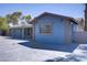 Beautiful single Gathering home exterior, featuring large driveway and well-lit exterior at 4490 W Warm Springs Rd, Las Vegas, NV 89118